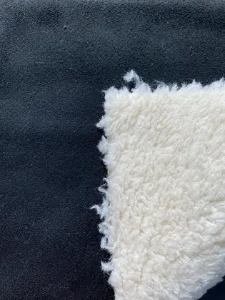 22571 Fabric · Domestic · Lez · Polyester · Black Leather · Beige Fur · 145 cm
